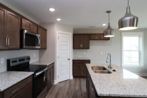 Side view of kitchen with pantry in Maria floor plan | Homes in Southern Indiana