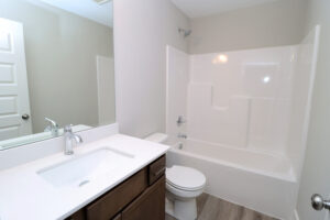 Guest bathroom with toilet and tub in the Maria floor plan | Homes in Southern Indiana
